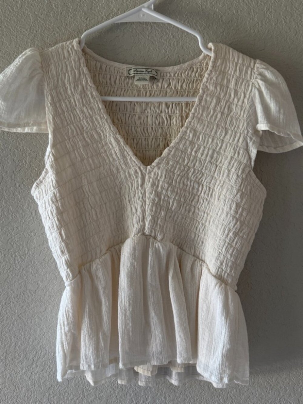 Title: American Eagle Cream Smocked Peplum Blouse Small